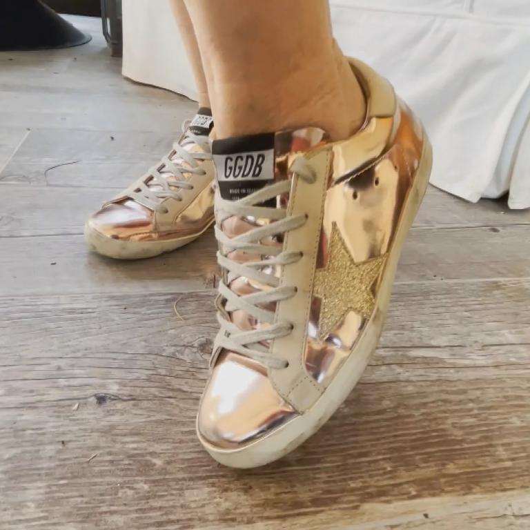 Gretta wearing Golden Goose sneakers