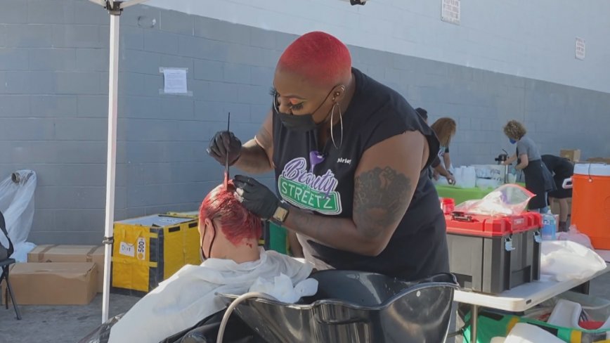 Beauty 2 the Streetz Founder Shirley coloring hair. 