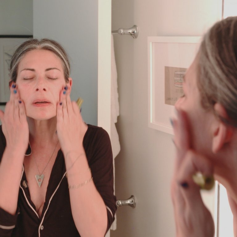 Stacy London applying State Of spray.