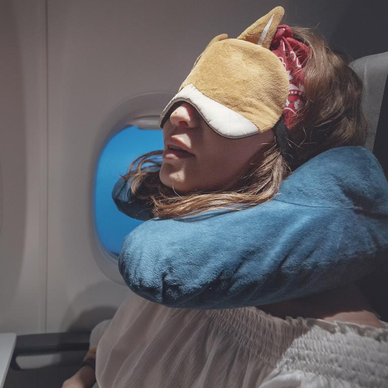 sleeping on plane